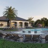 pool with spacious areas and lush landscaping