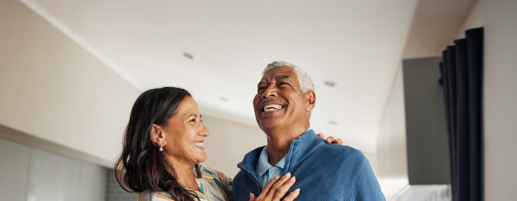 a man and a woman laughing